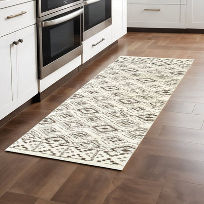2' X 8' Ivory And Brown Geometric Shag Power Loom Stain Resistant Runner Rug