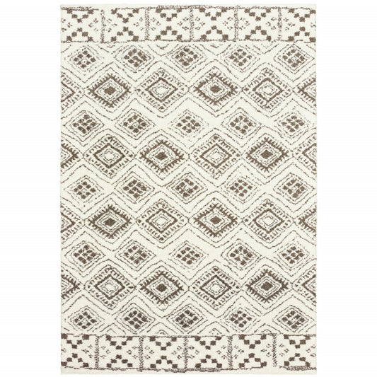 2' X 3' Ivory And Brown Geometric Shag Power Loom Stain Resistant Area Rug