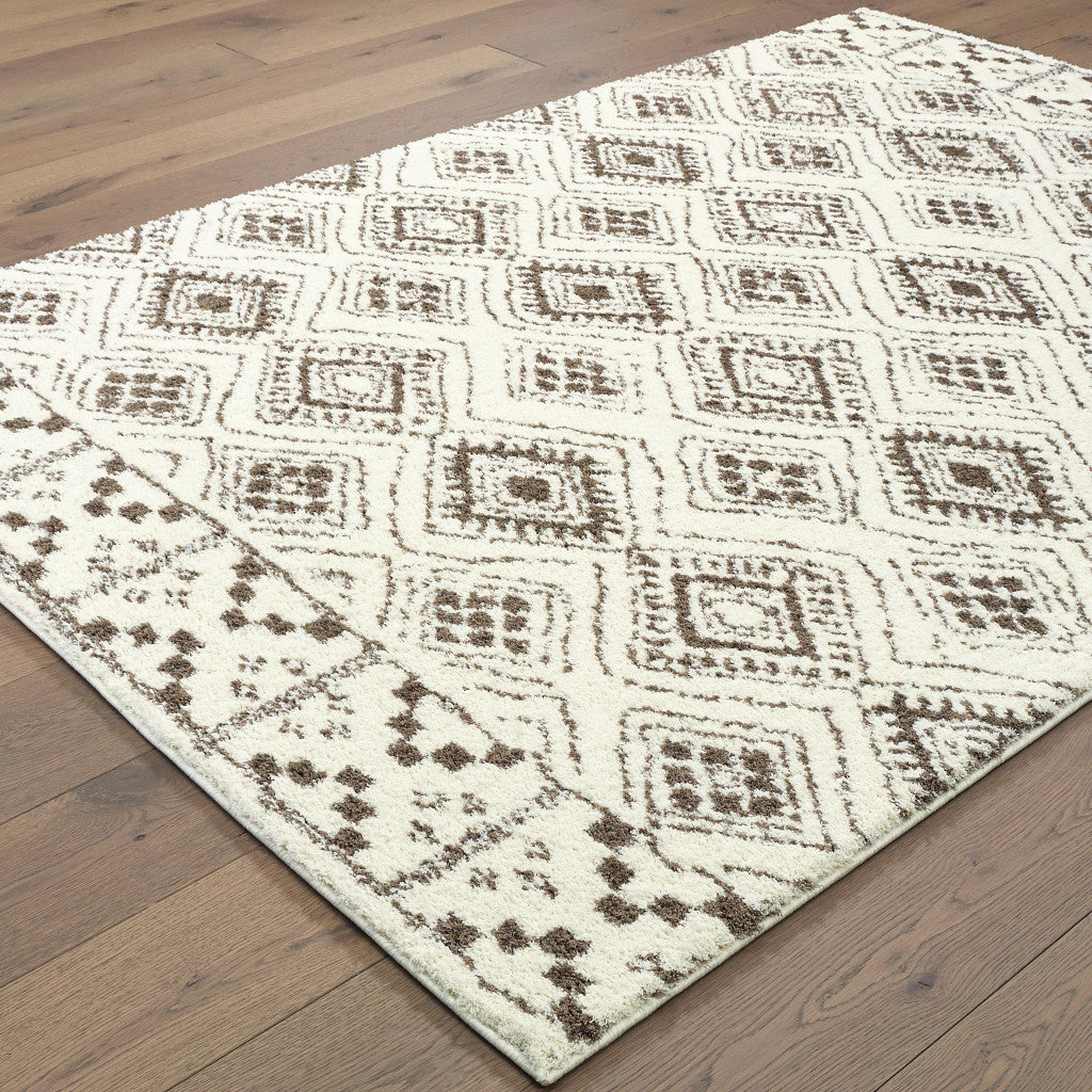 2' X 3' Ivory And Brown Geometric Shag Power Loom Stain Resistant Area Rug