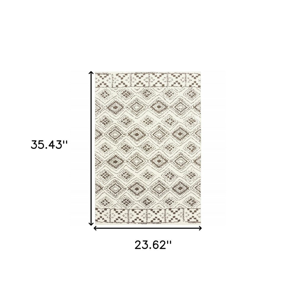 2' X 3' Ivory And Brown Geometric Shag Power Loom Stain Resistant Area Rug