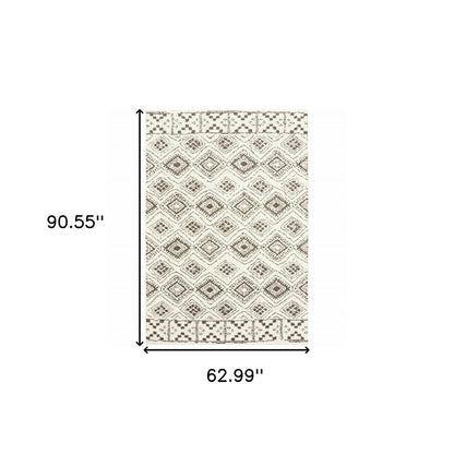5' X 8' Ivory And Brown Geometric Shag Power Loom Stain Resistant Area Rug
