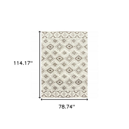 7' X 10' Ivory And Brown Geometric Shag Area Rug
