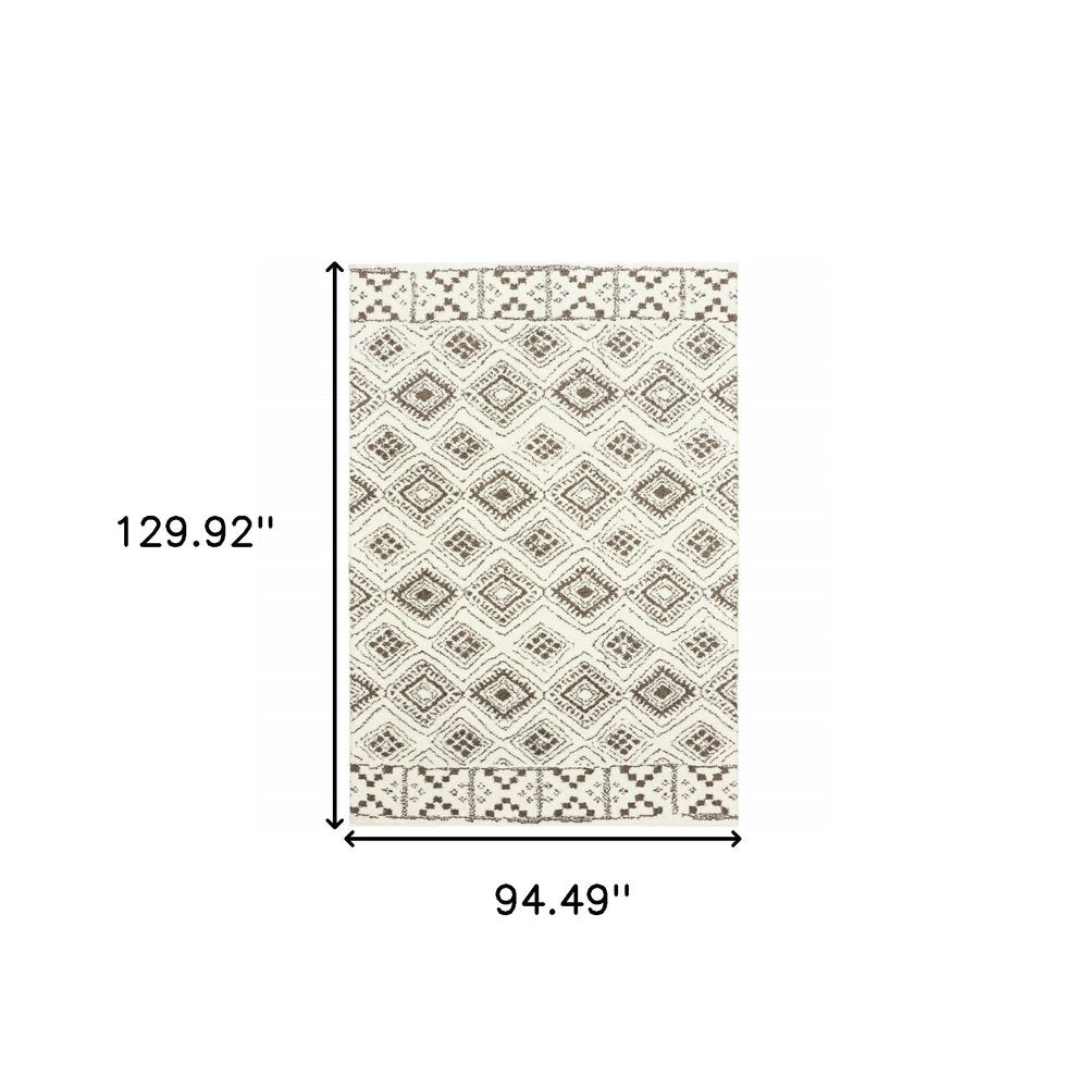 8' X 11' Ivory And Brown Geometric Shag Area Rug
