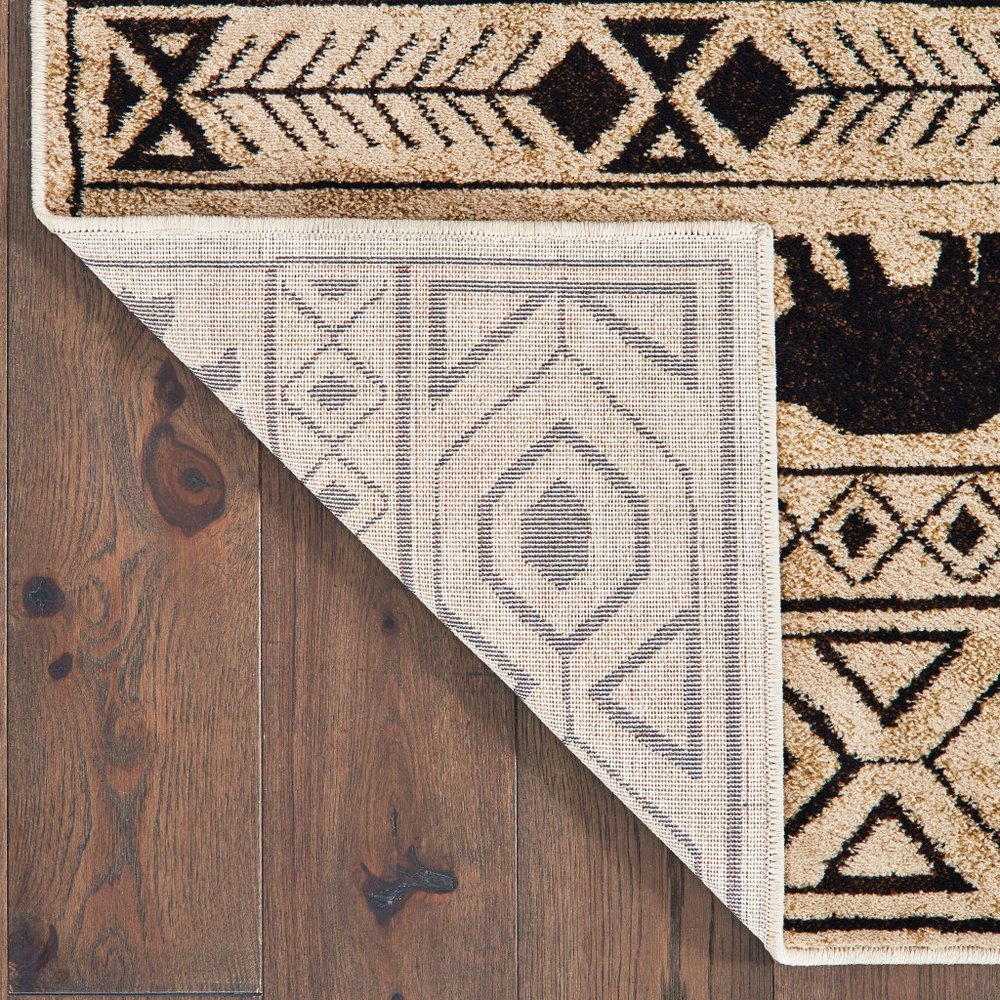 7' X 9' Ivory And Black Southwestern Area Rug