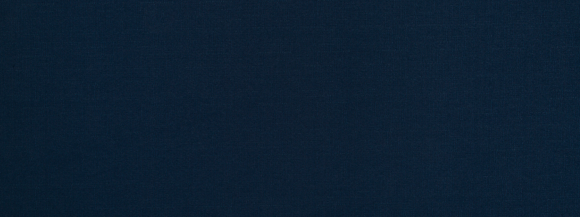 Solid navy blue fabric texture, close-up.