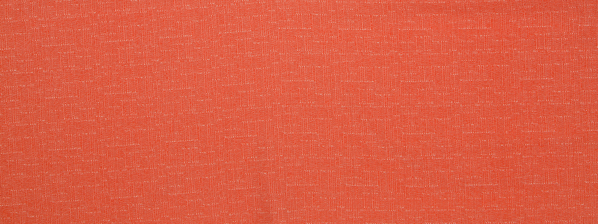 Close-up of orange-red plush upholstery fabric with a soft, textured surface.