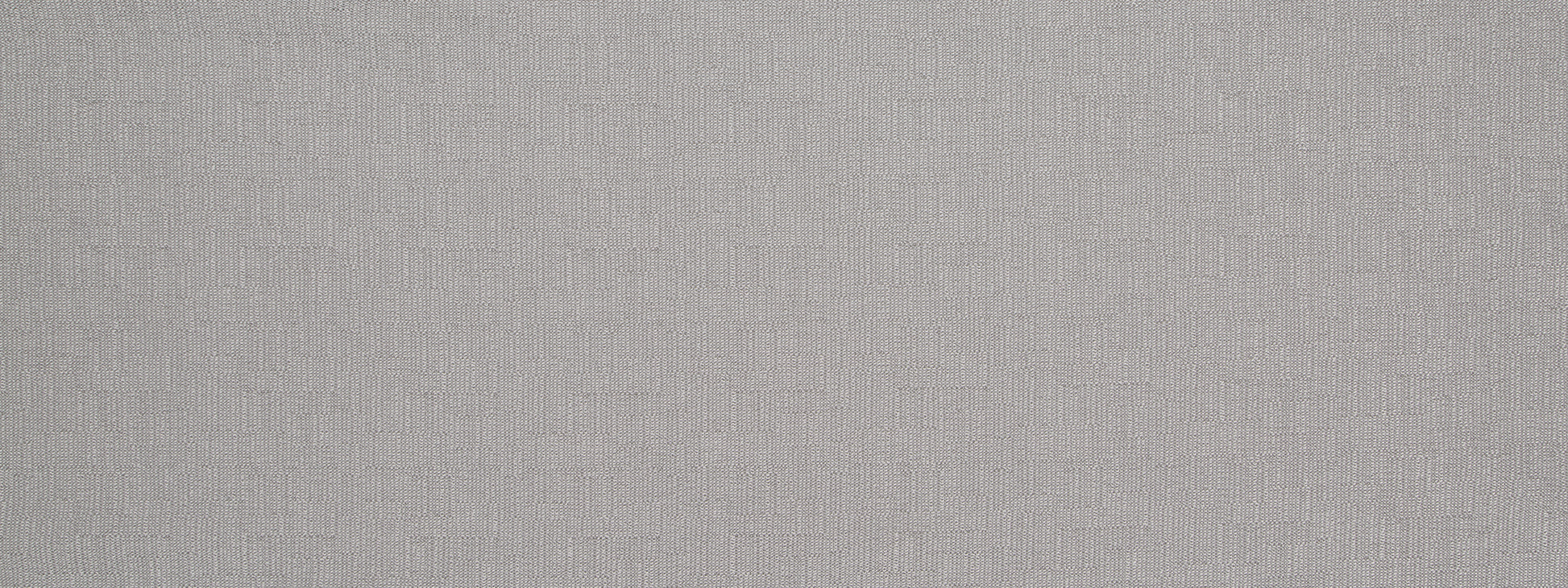 Light gray plush upholstery fabric texture with a soft surface.