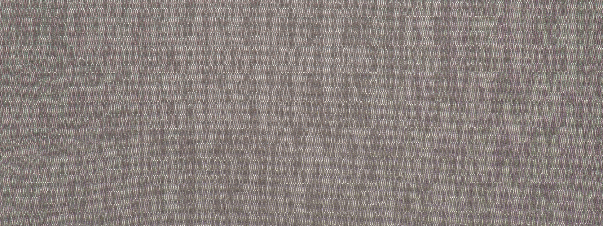 Close-up of light gray-beige woven upholstery fabric with a subtle grid texture.