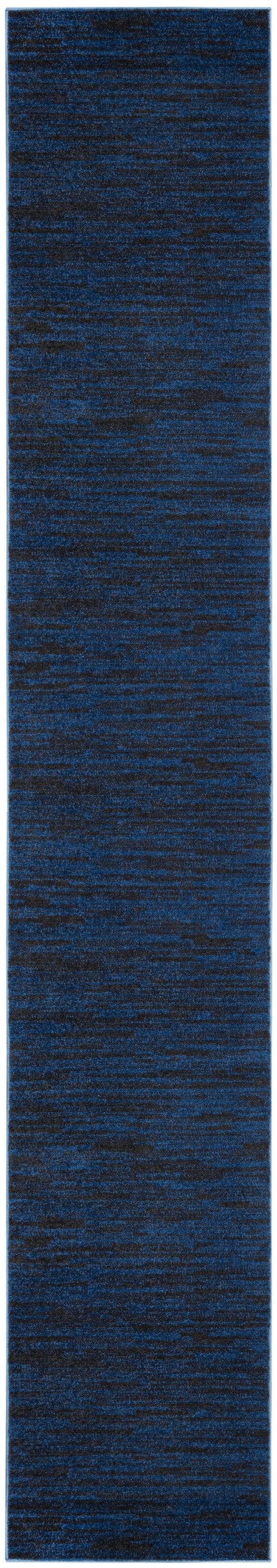 Long navy blue textured rug runner with subtle marled pattern and light blue border.