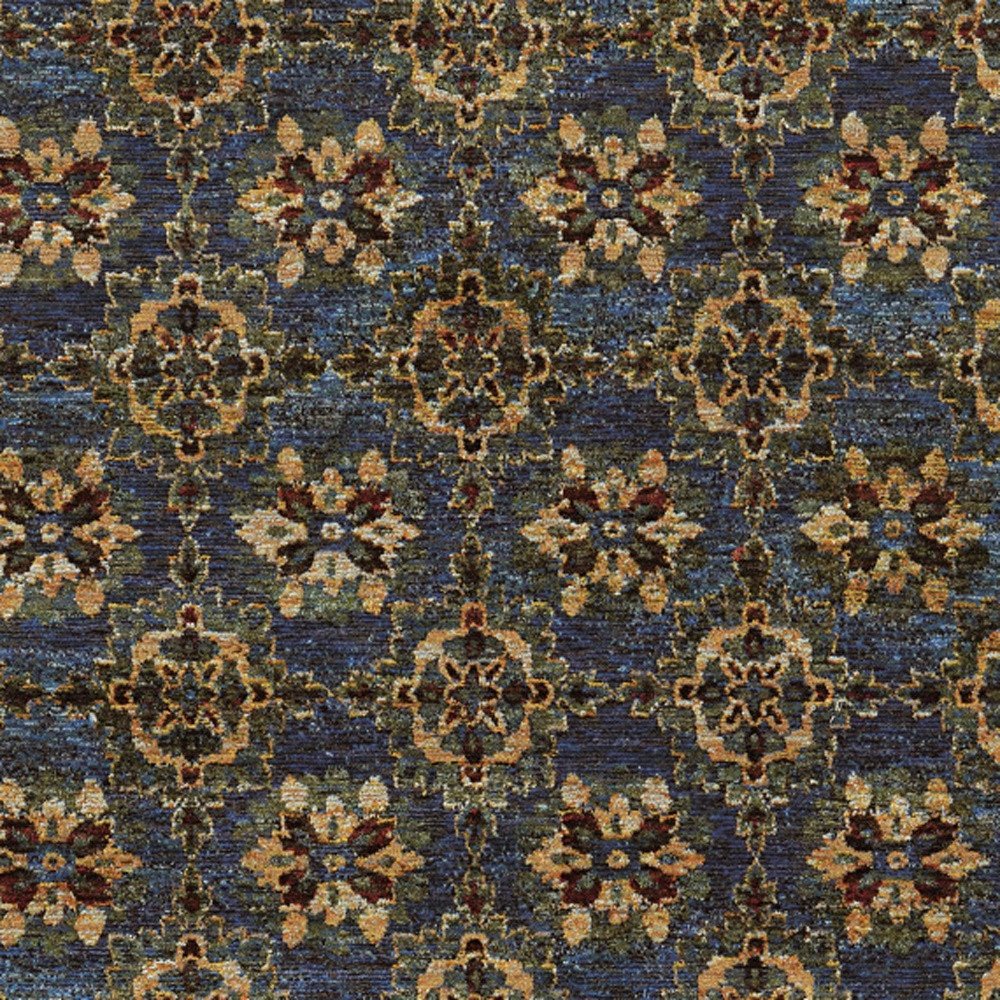 Blue & gold oriental rug with ivory, tan & red floral medallions in a repeating lattice pattern.