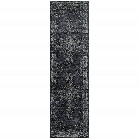 8' blue and ivory oriental runner rug with a distressed pattern.