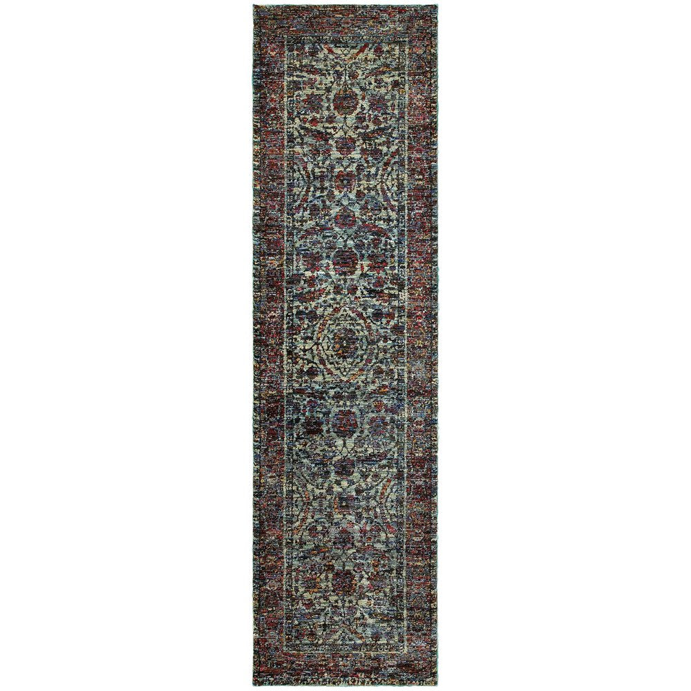 Persian-style runner rug with blue-gray field & red border, ornate floral medallions, distressed vintage look.