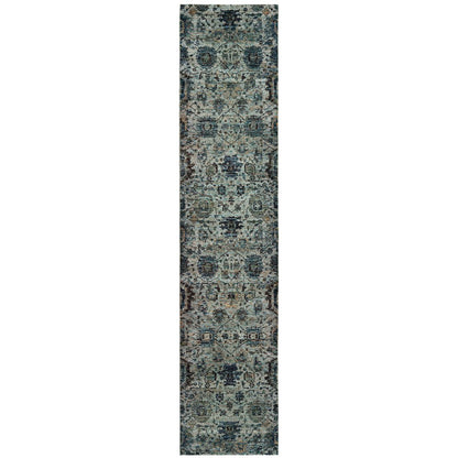 Narrow blue-gray oriental rug runner with a distressed vintage pattern and geometric motifs.