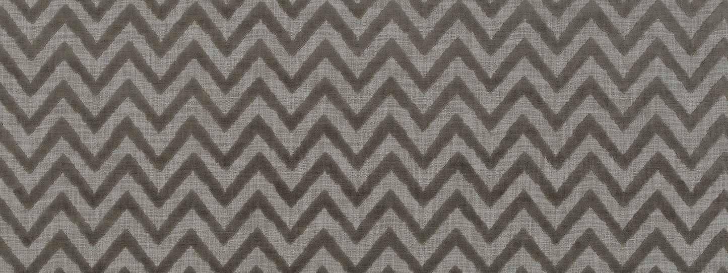 Grey chevron zigzag fabric pattern in tonal greys, geometric textile for upholstery or drapery.