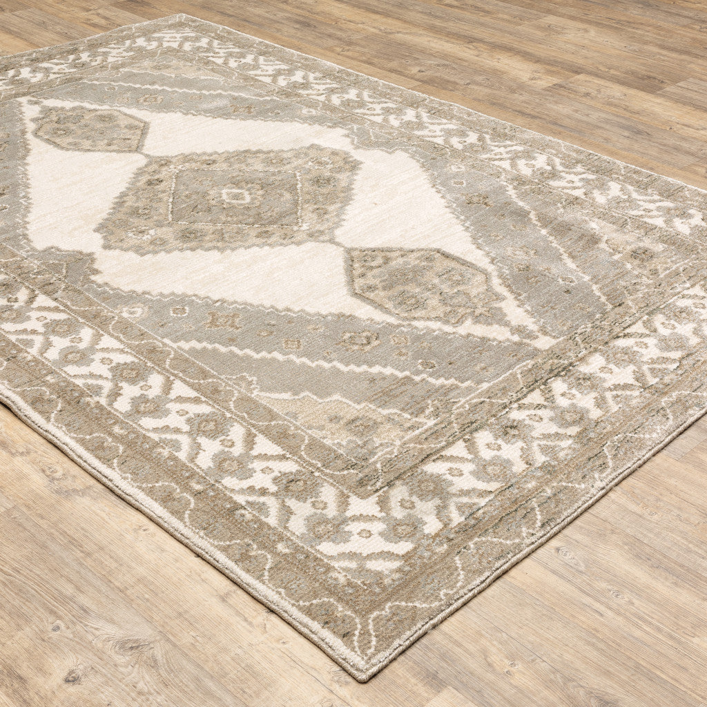 2' X 3' Beige and Ivory Oriental Power Loom Area Rug