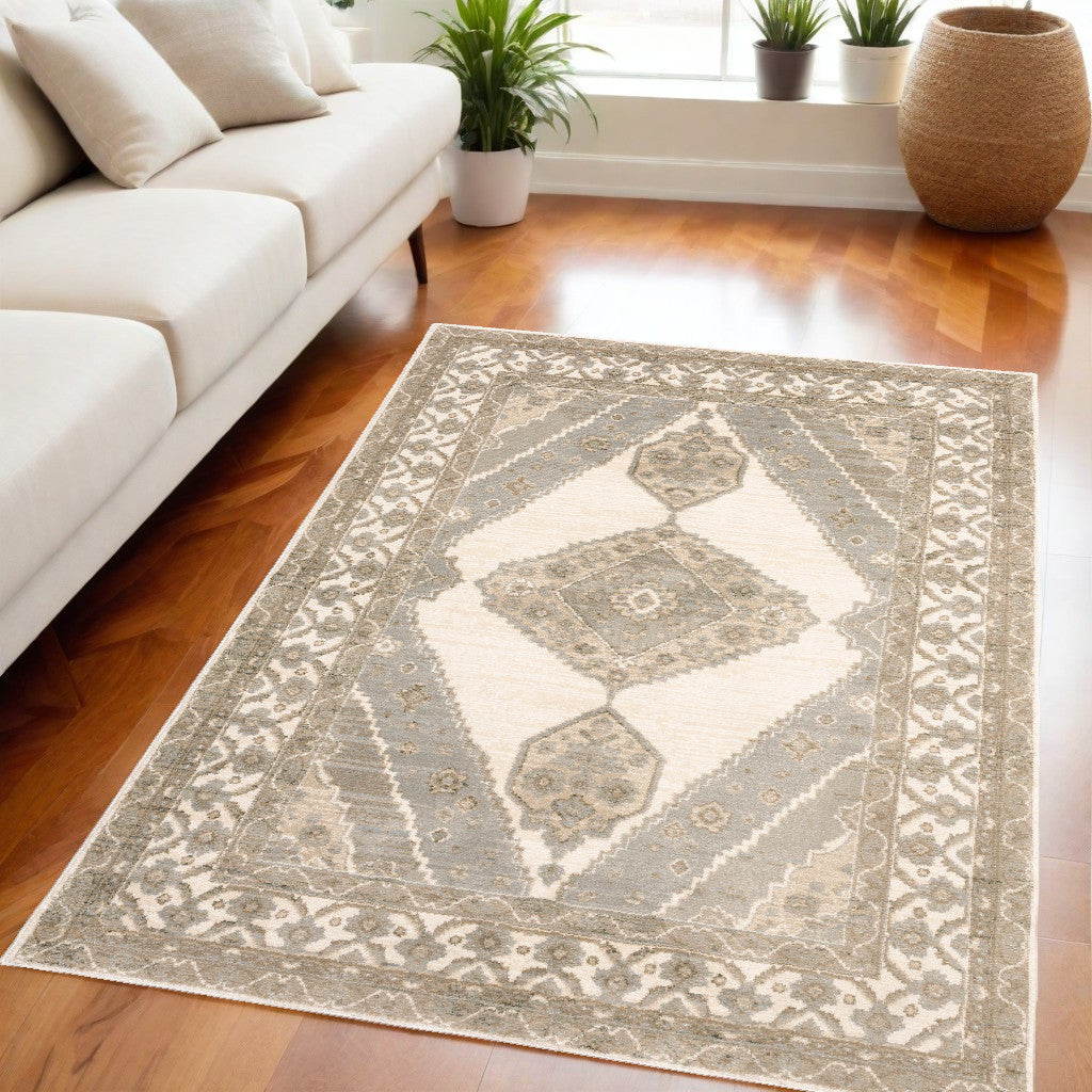 5' X 7' Beige and Ivory Oriental Power Loom Area Rug