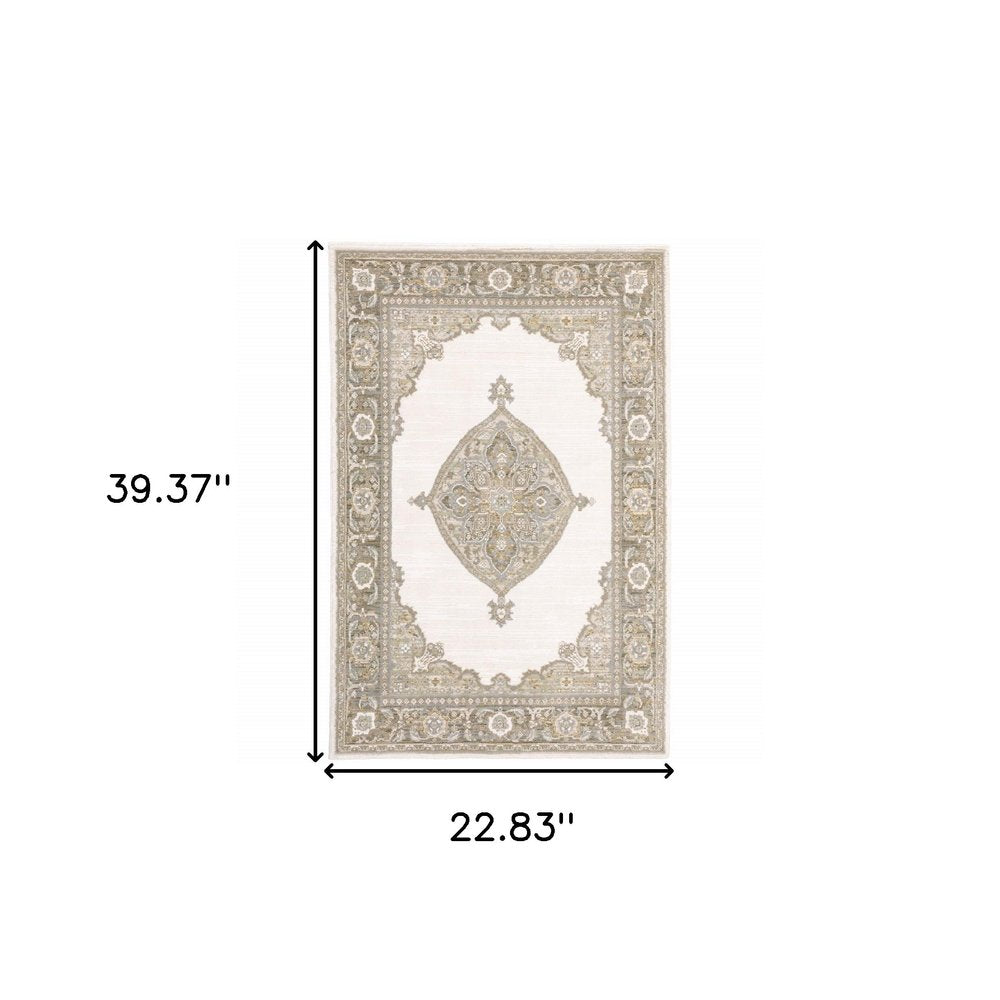 Beige Persian-style area rug with a cream central medallion and ornate border; 39.37 x 22.83 inches.