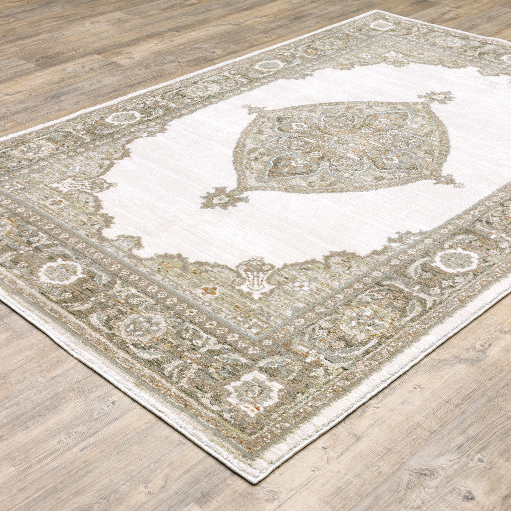 3' X 5' Beige and Ivory Oriental Power Loom Area Rug