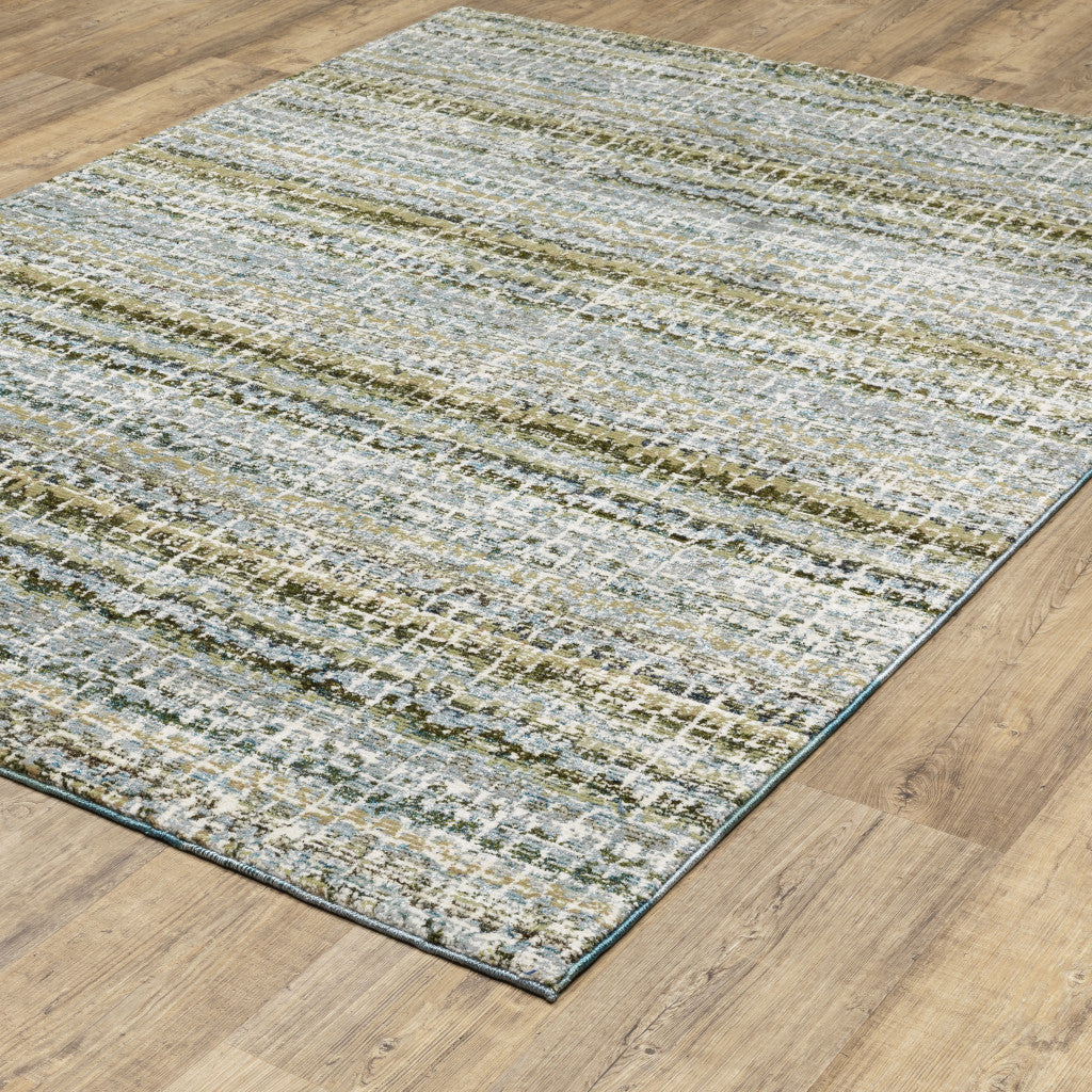 7' x 10' Blue and Ivory Abstract Power Loom Area Rug