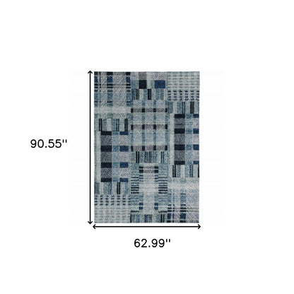 5' x 7' blue geometric power loom area rug