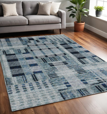 5' x 7' blue geometric power loom area rug