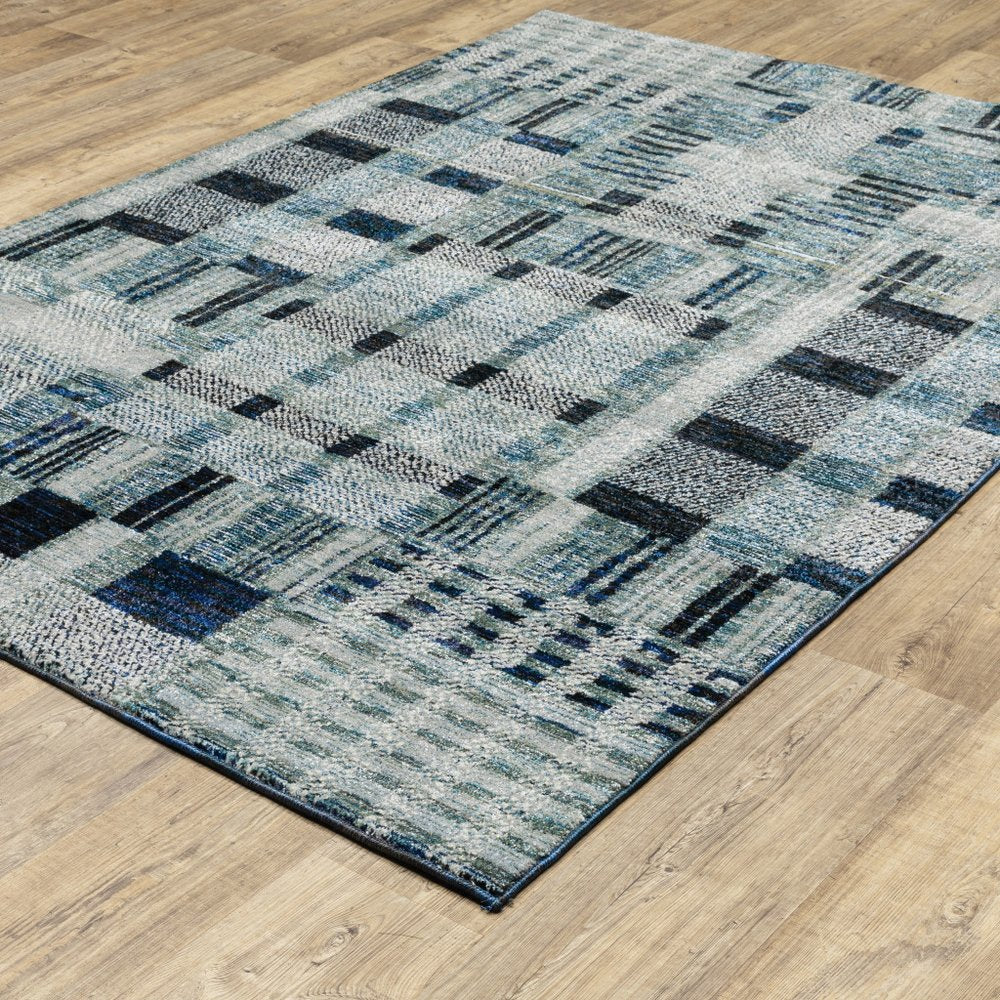 5' x 7' blue geometric power loom area rug