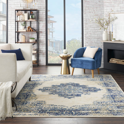 Vintage 7' x 10' blue-beige patterned rug.