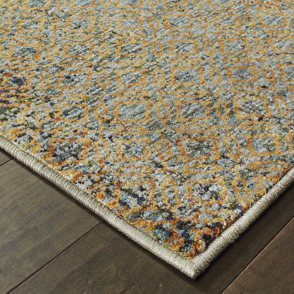 7' X 10' Blue And Gold Geometric Distressed Area Rug