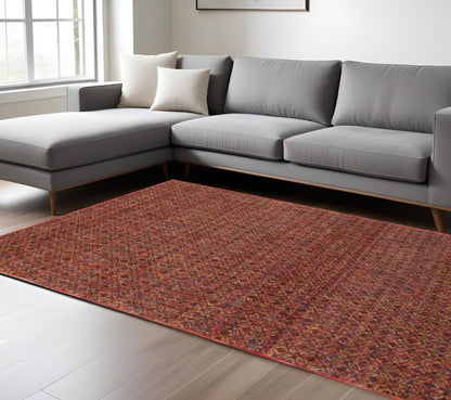 7' X 10' Red and Gold Geometric Power Loom Area Rug