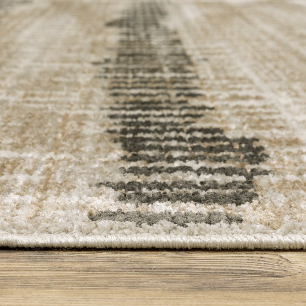 4' x 6' beige ivory charcoal brown tan and grey abstract power loom stain-resistant area rug with fringe