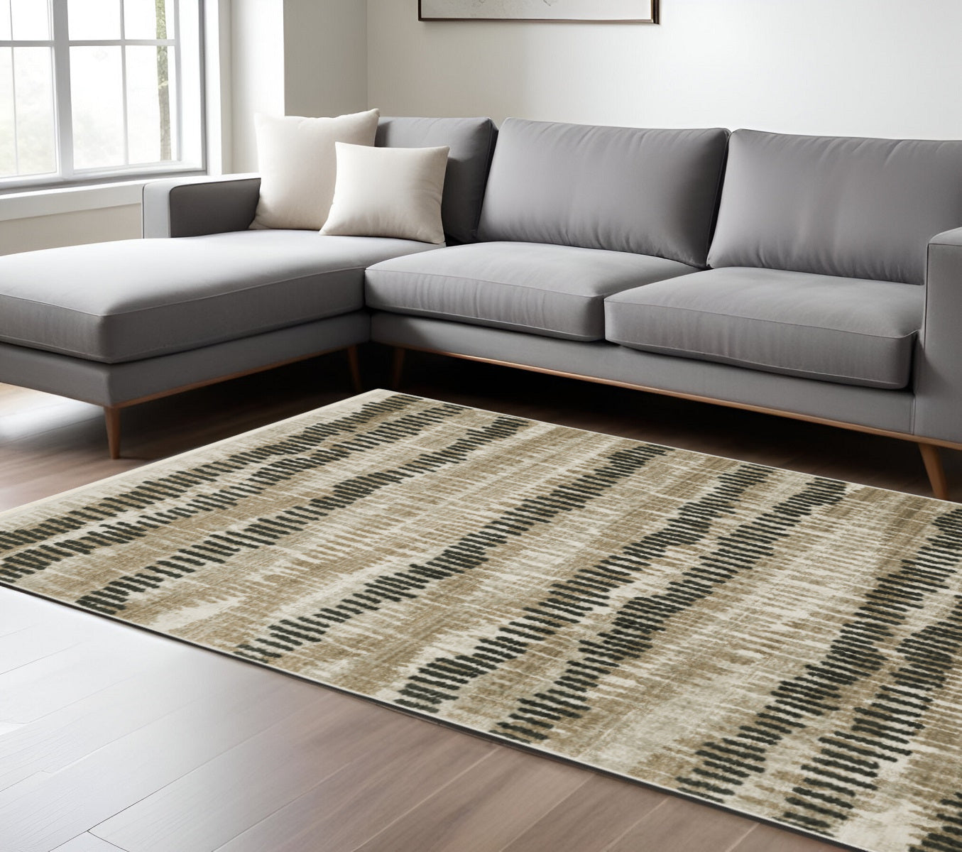 6' X 9' Beige Ivory Charcoal Brown Tan And Grey Abstract Power Loom Stain Resistant Area Rug With Fringe