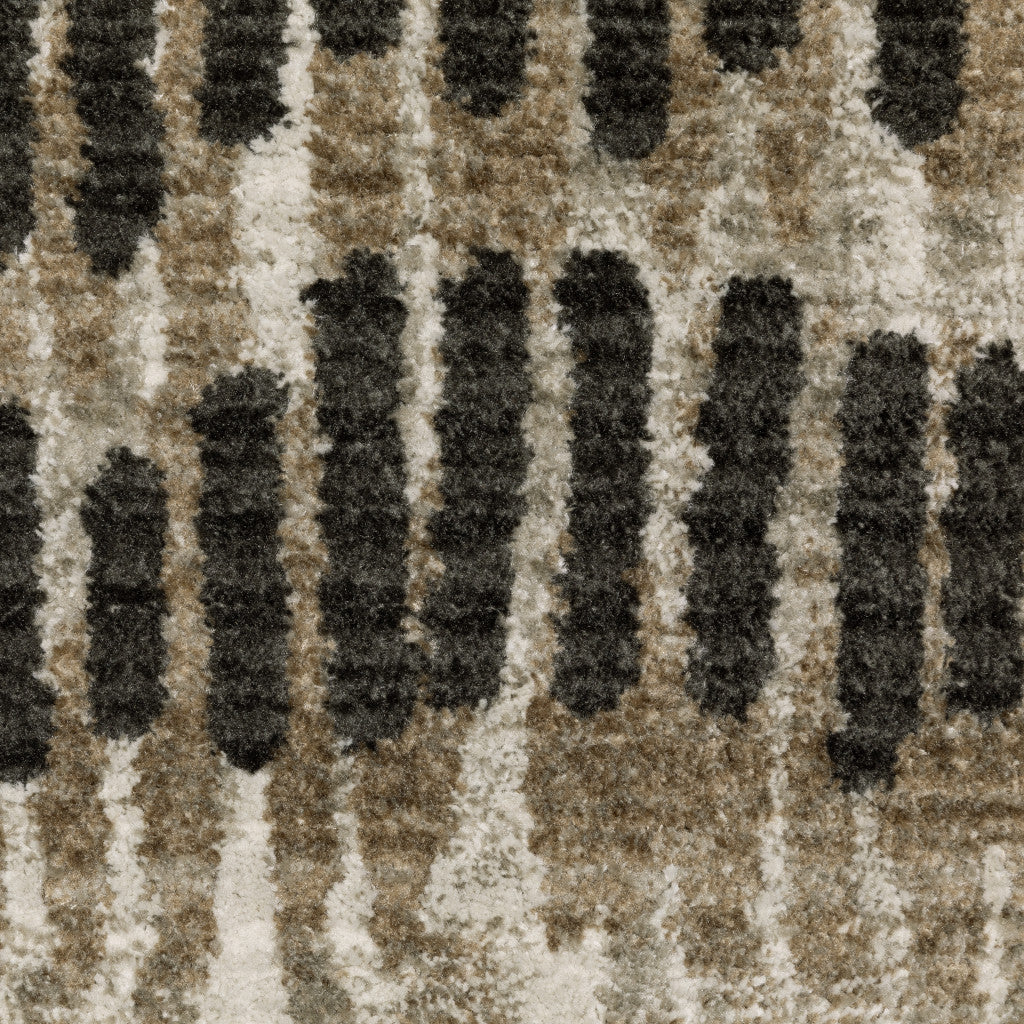 6' X 9' Beige Ivory Charcoal Brown Tan And Grey Abstract Power Loom Stain Resistant Area Rug With Fringe