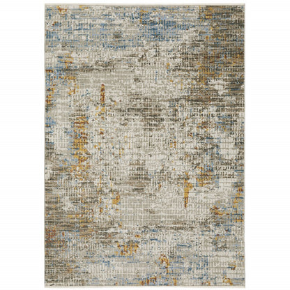 4' x 6' beige, grey, brown, gold, red and blue abstract area rug with fringe; power-loomed and stain resistant.
