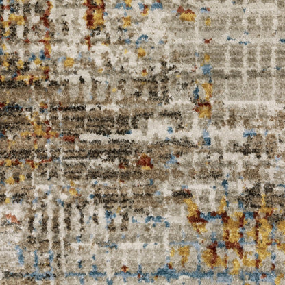 4' x 6' beige, grey, brown, gold, red & blue abstract power loom area rug with fringe, stain resistant