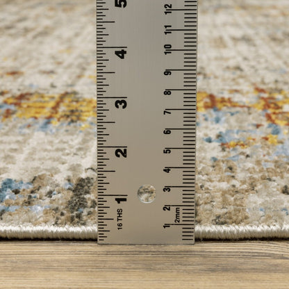 4' X 6' beige, grey, brown, gold, red and blue abstract power loom area rug with fringe, stain resistant