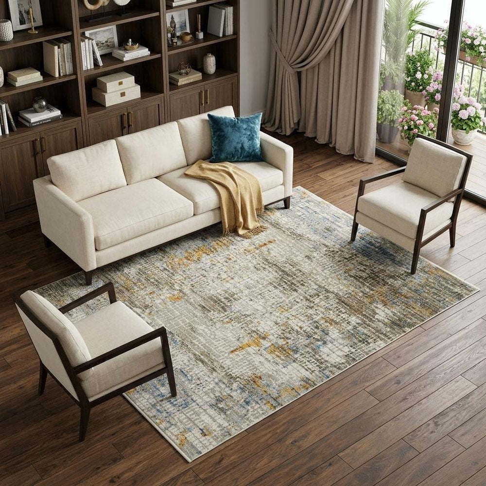 6' X 9' Beige Grey Brown Gold Red And Blue Abstract Power Loom Stain Resistant Area Rug With Fringe