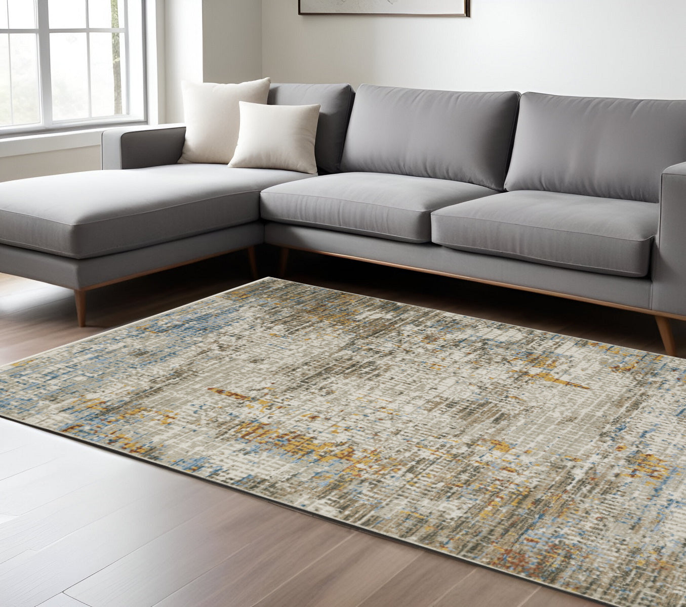 8' X 11' Beige Grey Brown Gold Red And Blue Abstract Power Loom Stain Resistant Area Rug With Fringe