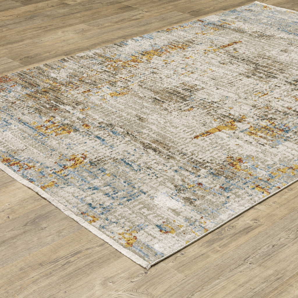 8' X 11' Beige Grey Brown Gold Red And Blue Abstract Power Loom Stain Resistant Area Rug With Fringe