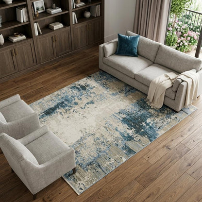 6' X 9' Blue Grey Ivory Light Blue And Dark Blue Abstract Power Loom Stain Resistant Area Rug With Fringe