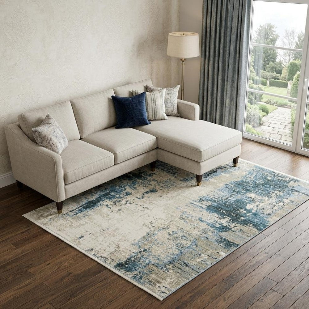 10' X 13' Blue Grey Ivory Light Blue And Dark Blue Abstract Power Loom Stain Resistant Area Rug With Fringe