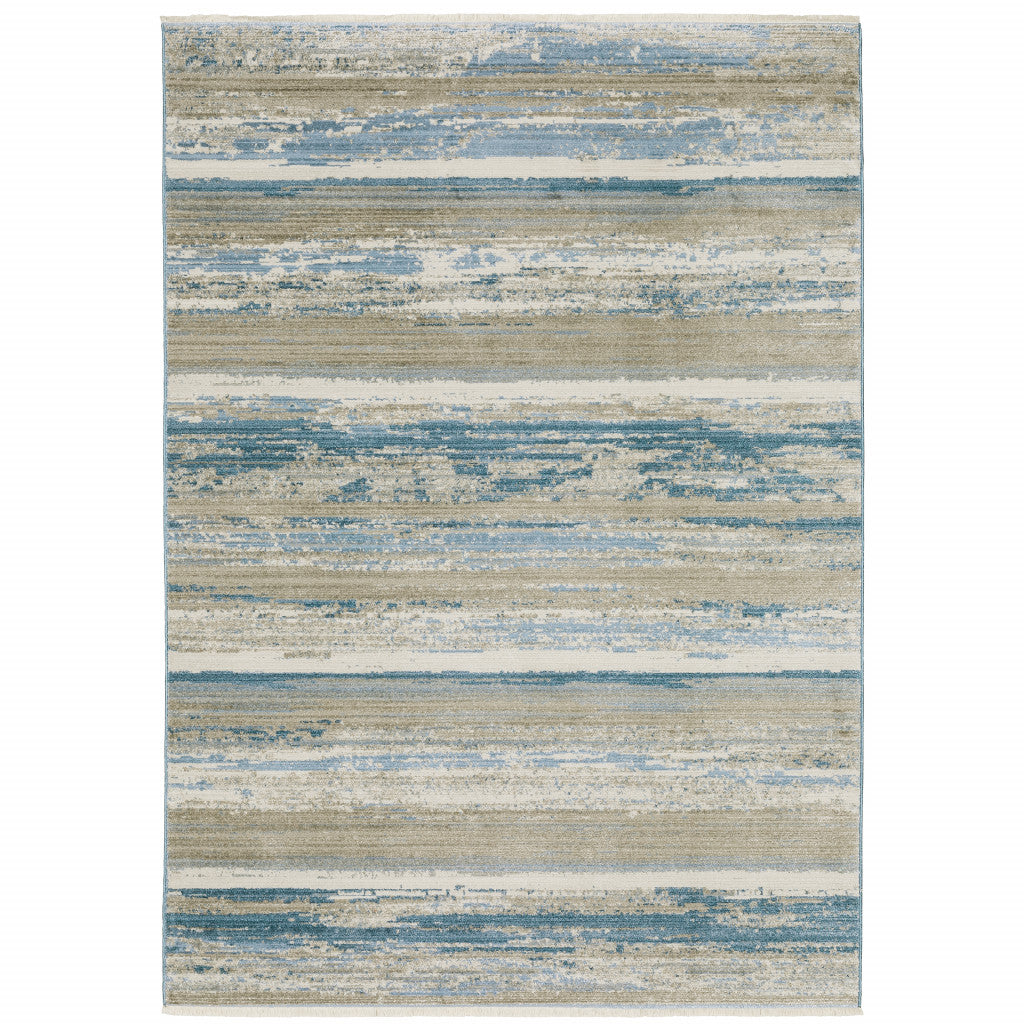 4' X 6' Ivory Beige Grey Blue And Tan Abstract Power Loom Stain Resistant Area Rug With Fringe