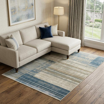 6' X 9' Blue Dark Blue Teal Grey Ivory Beige And Tan Geometric Power Loom Stain Resistant Area Rug With Fringe