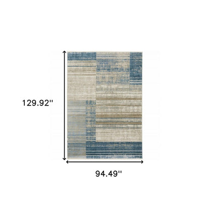 8' X 11' Blue Dark Blue Teal Grey Ivory Beige And Tan Geometric Power Loom Stain Resistant Area Rug With Fringe