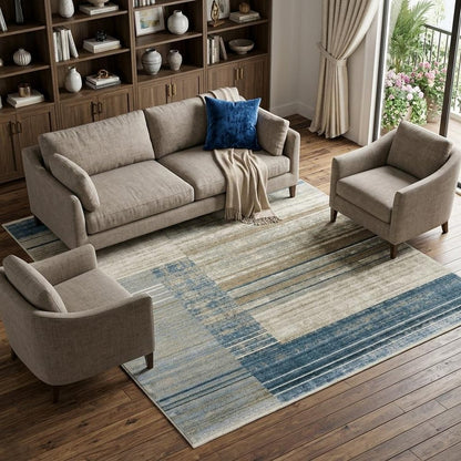 8' X 11' Blue Dark Blue Teal Grey Ivory Beige And Tan Geometric Power Loom Stain Resistant Area Rug With Fringe
