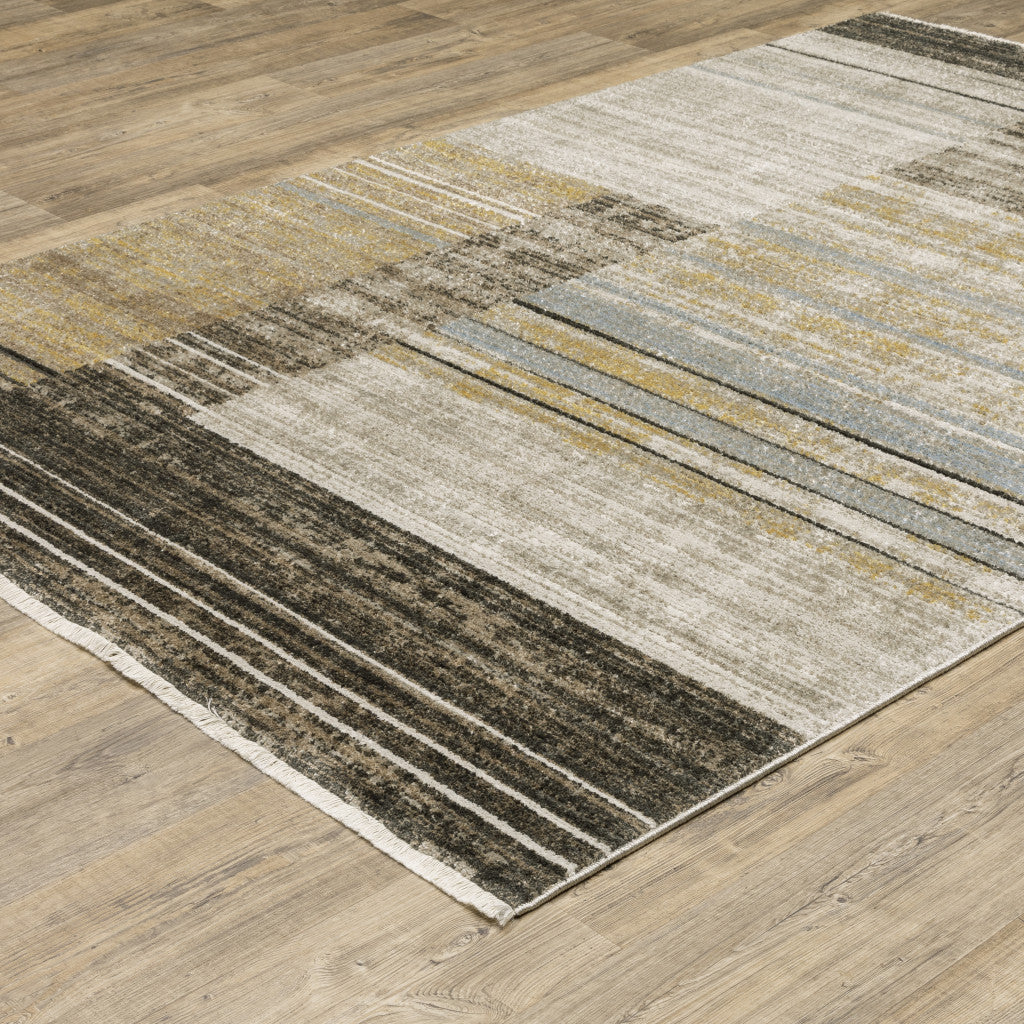 4' X 6' Beige Charcoal Brown Grey Tan Gold And Blue Geometric Power Loom Stain Resistant Area Rug With Fringe