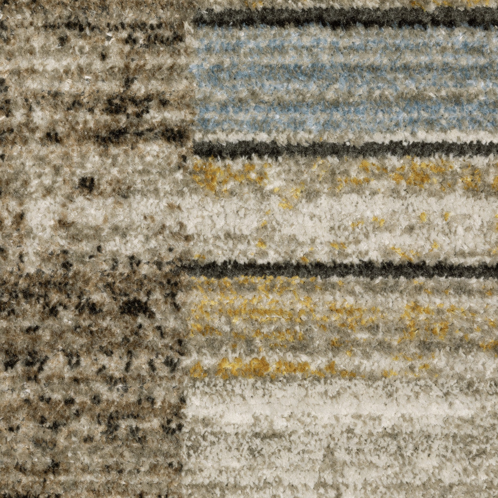 4' X 6' Beige Charcoal Brown Grey Tan Gold And Blue Geometric Power Loom Stain Resistant Area Rug With Fringe