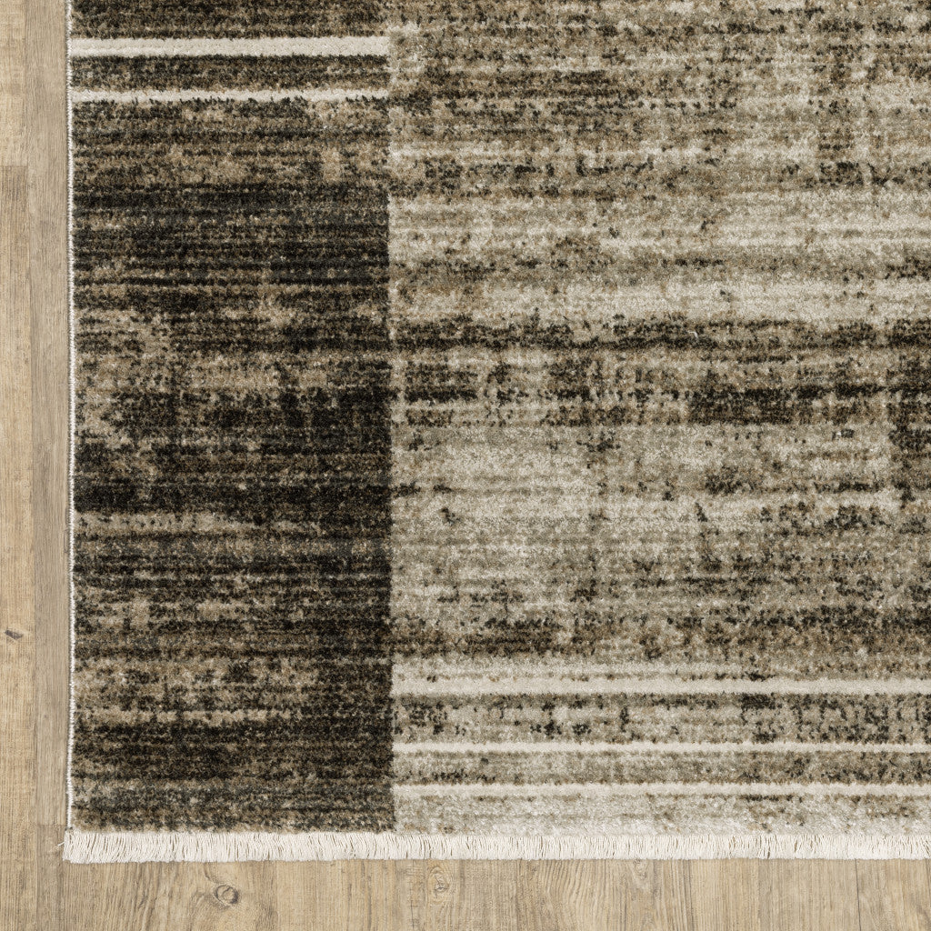 5' X 8' Beige Charcoal Brown Grey Tan Gold And Blue Geometric Power Loom Stain Resistant Area Rug With Fringe