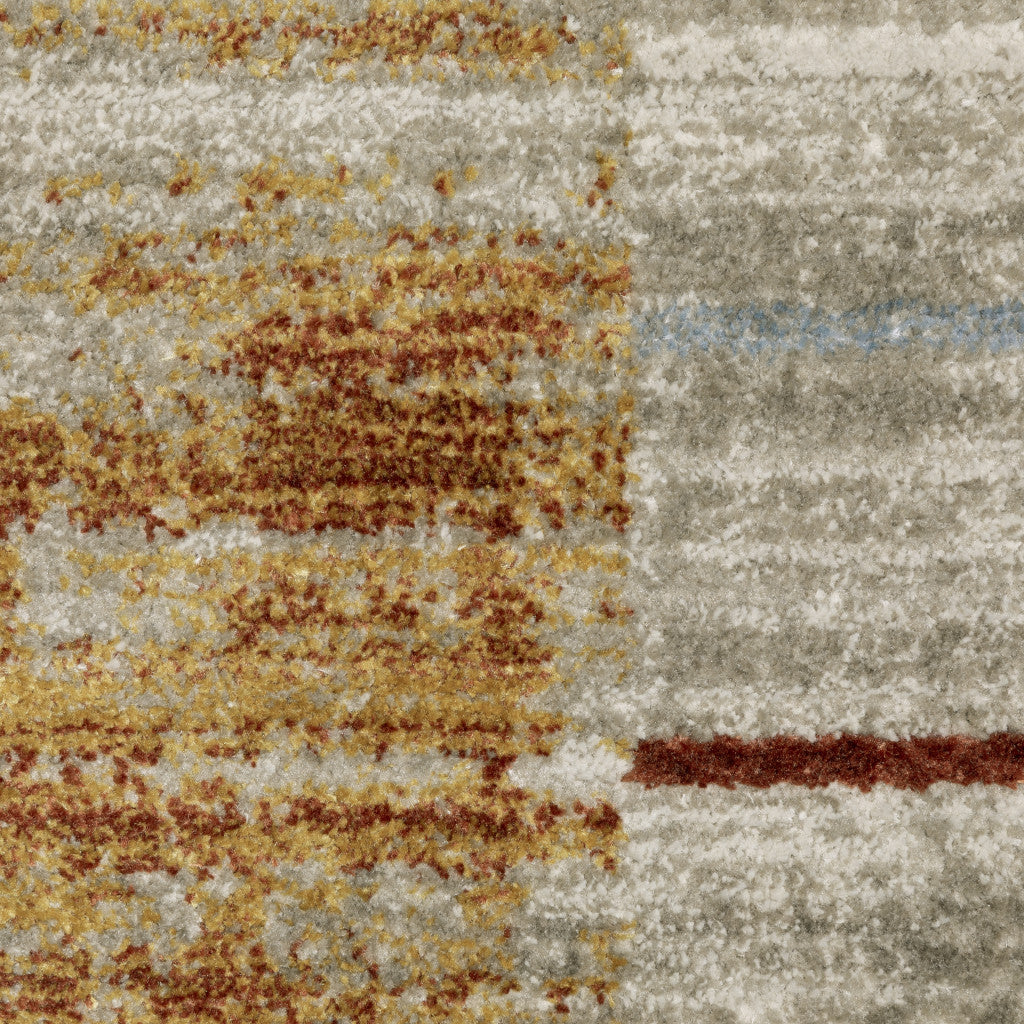 4' X 6' Rust Gold Blue Grey Ivory And Tan Geometric Power Loom Stain Resistant Area Rug With Fringe