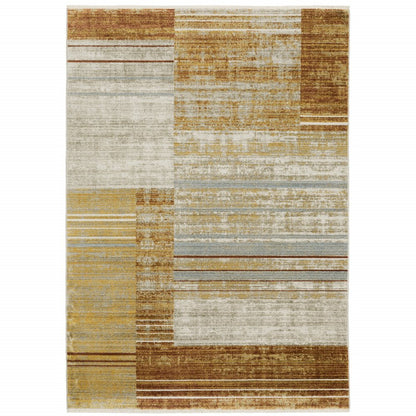 5' X 8' Rust Gold Blue Grey Ivory And Tan Geometric Power Loom Stain Resistant Area Rug With Fringe