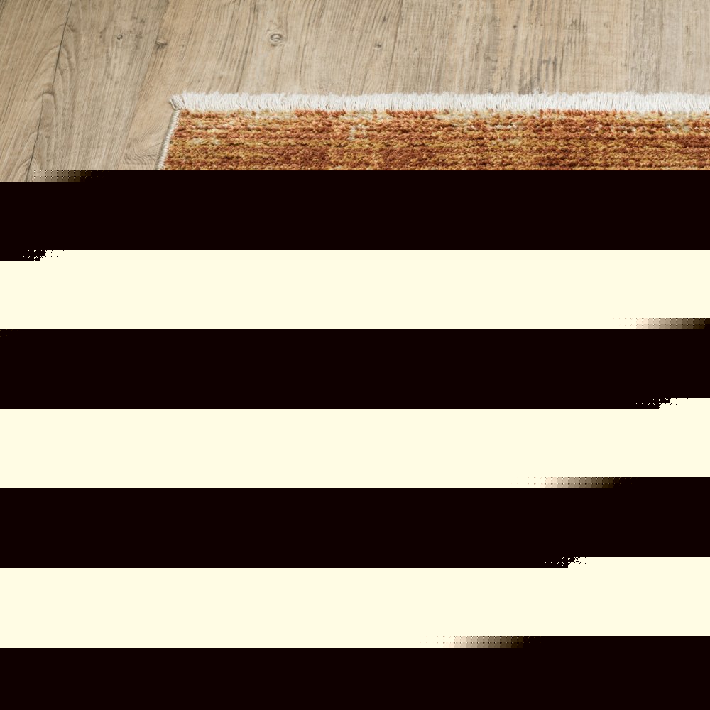 5' X 8' Rust Gold Blue Grey Ivory And Tan Geometric Power Loom Stain Resistant Area Rug With Fringe